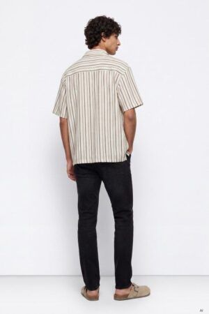 PANTALON VAQUERO TAPERED SLIM DYLAN