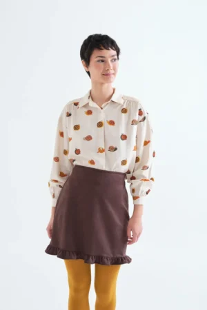 CAMISA CON ESTAMPADO CARACOLES