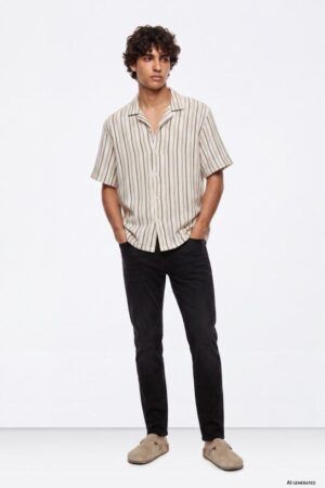 PANTALON VAQUERO TAPERED SLIM DYLAN